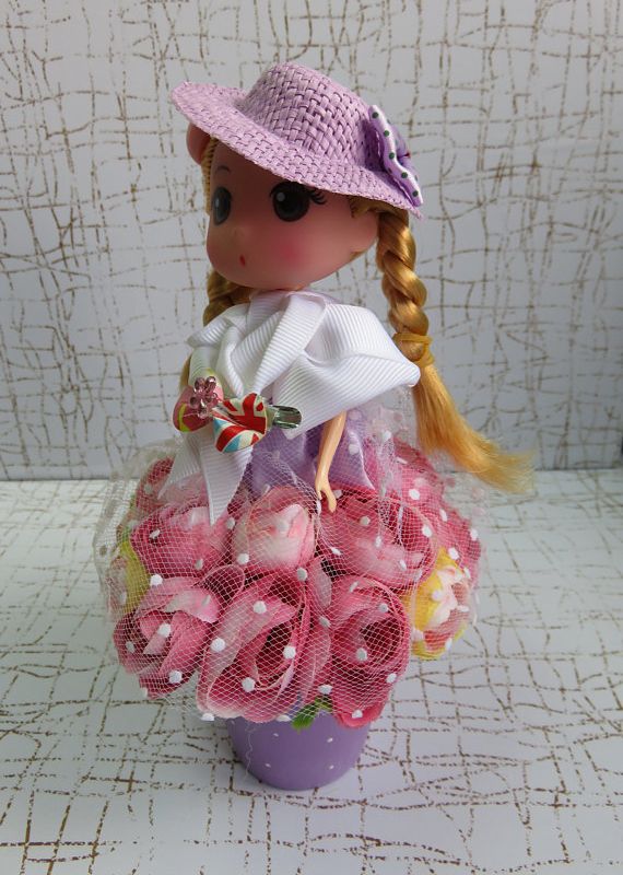 FLOWER DRESSED DOLL, THE DOLL IN PINK