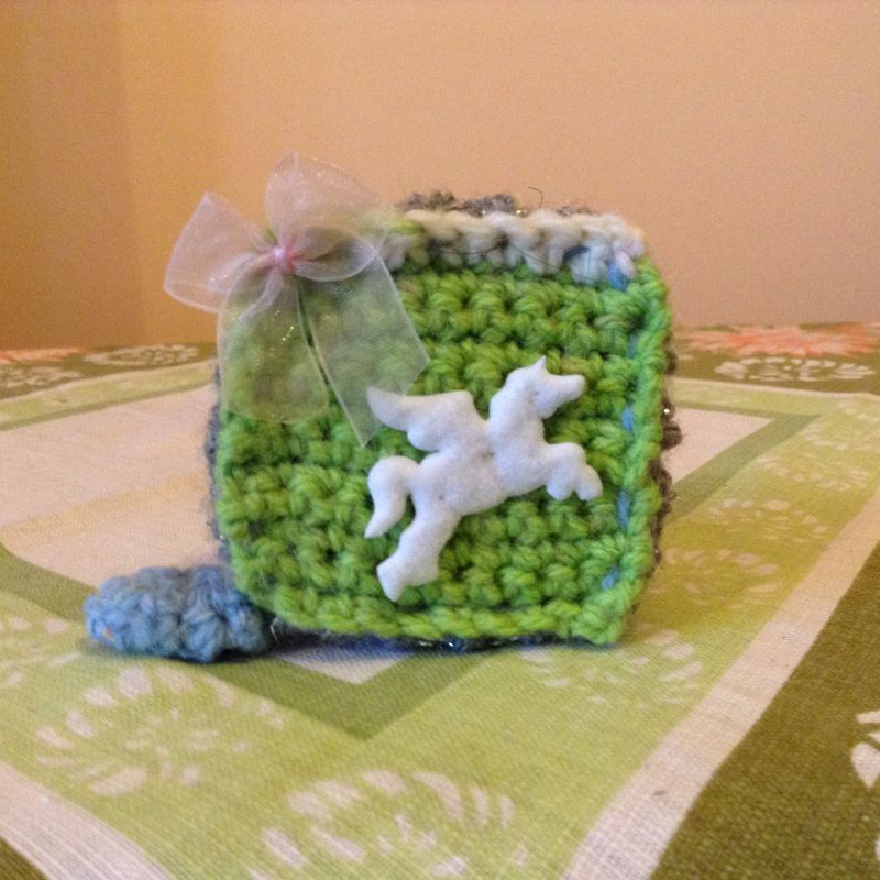 Dress makers tape measure in a beautiful crochet case