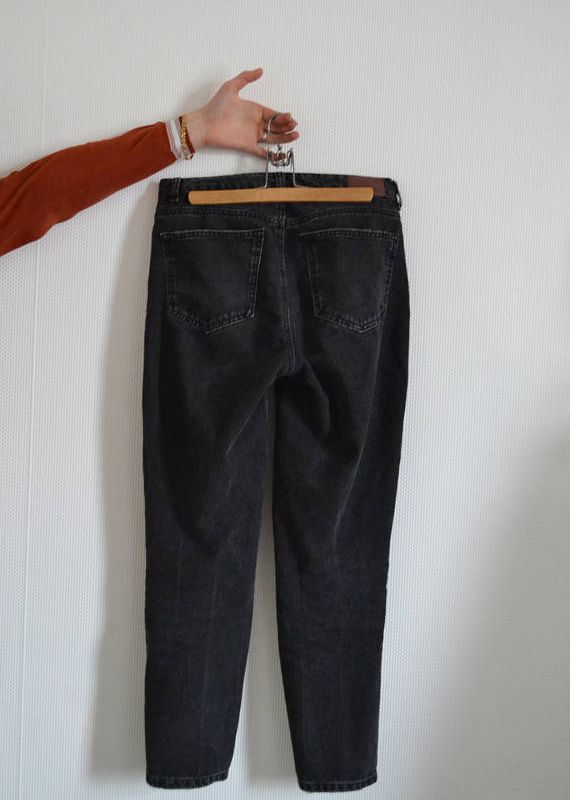 Black jeans with oneline faces