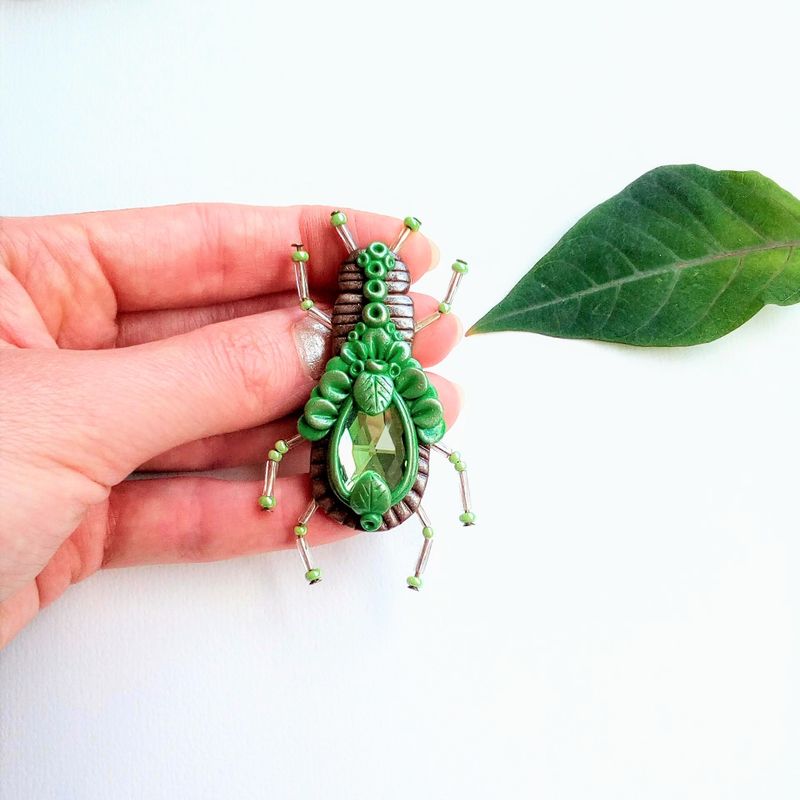 Insect brooch (handmade brown and green tones insect brooch with glass crystal made from polymer clay)