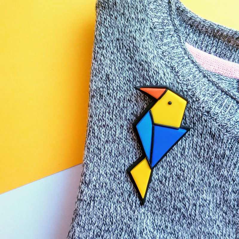 Origami style bird brooch handmade from polymer clay