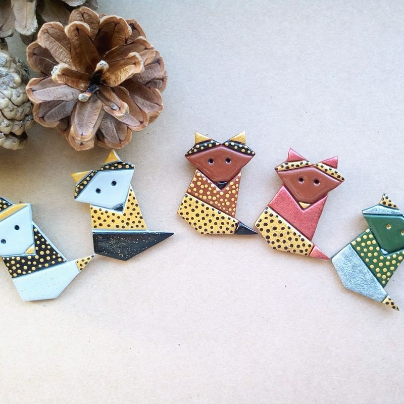 Full body origami style fox brooche made from polymer clay