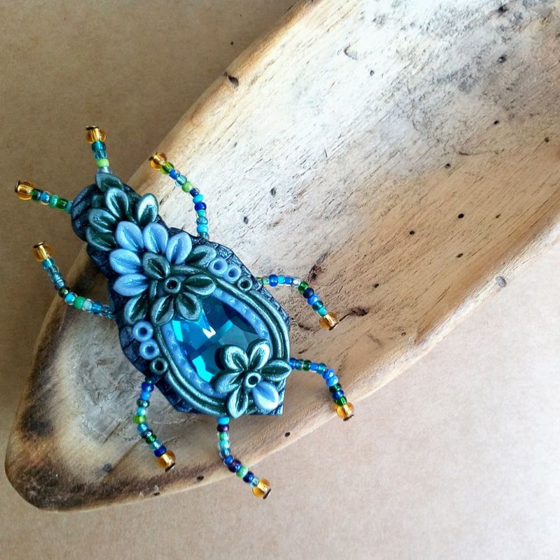 Insect brooch (handmade insect brooch with glass crystal made from polymer clay in black and blue tones)