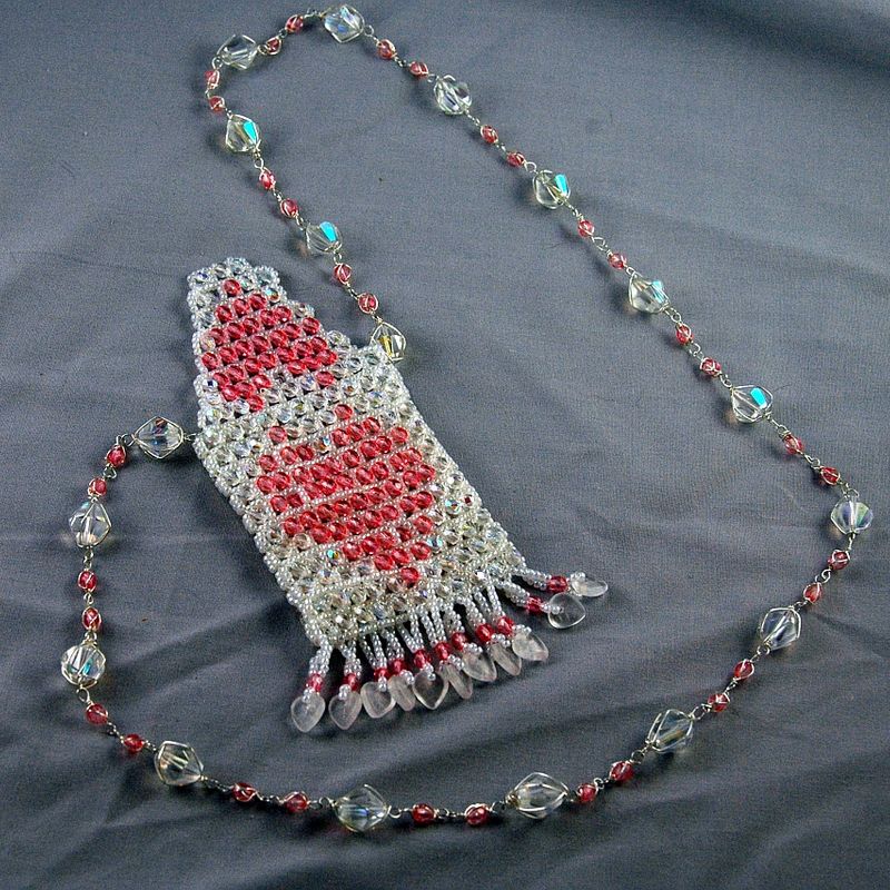 white with pink heart amulet bag