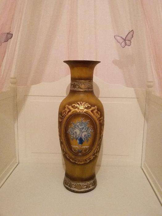 A floor standing vintage vase