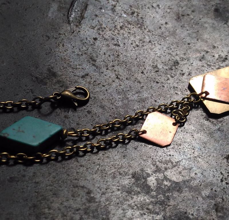Necklace with brass and copper rectangular pieces with turquise