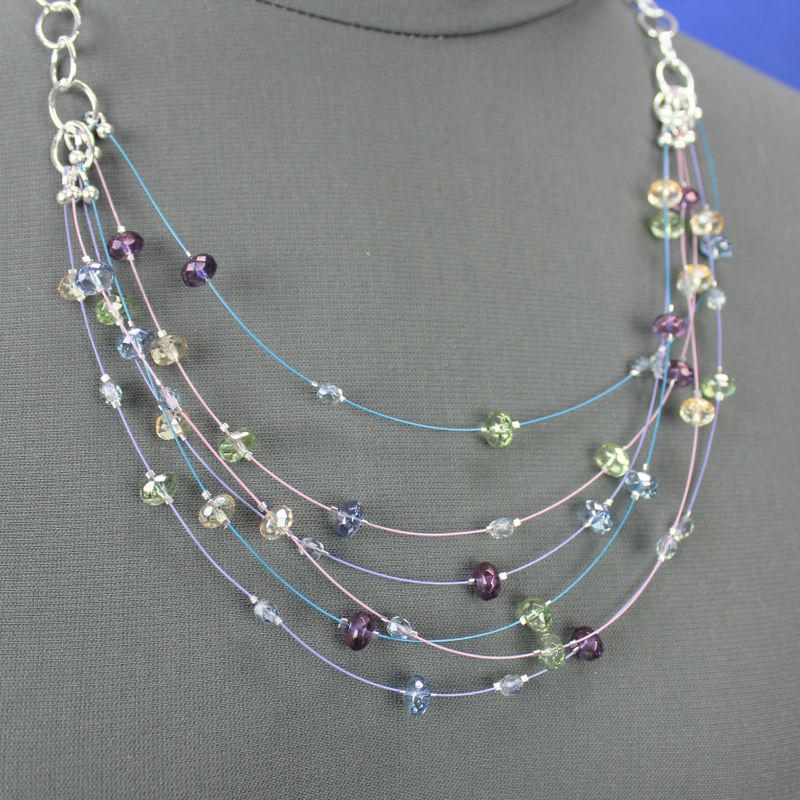 Multi-strand necklace with floating, Czech fire-polished glass beads and silver plated chain
