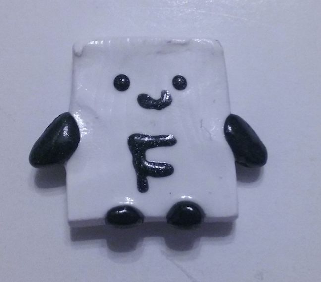 Black friday creature polymer clay magnet