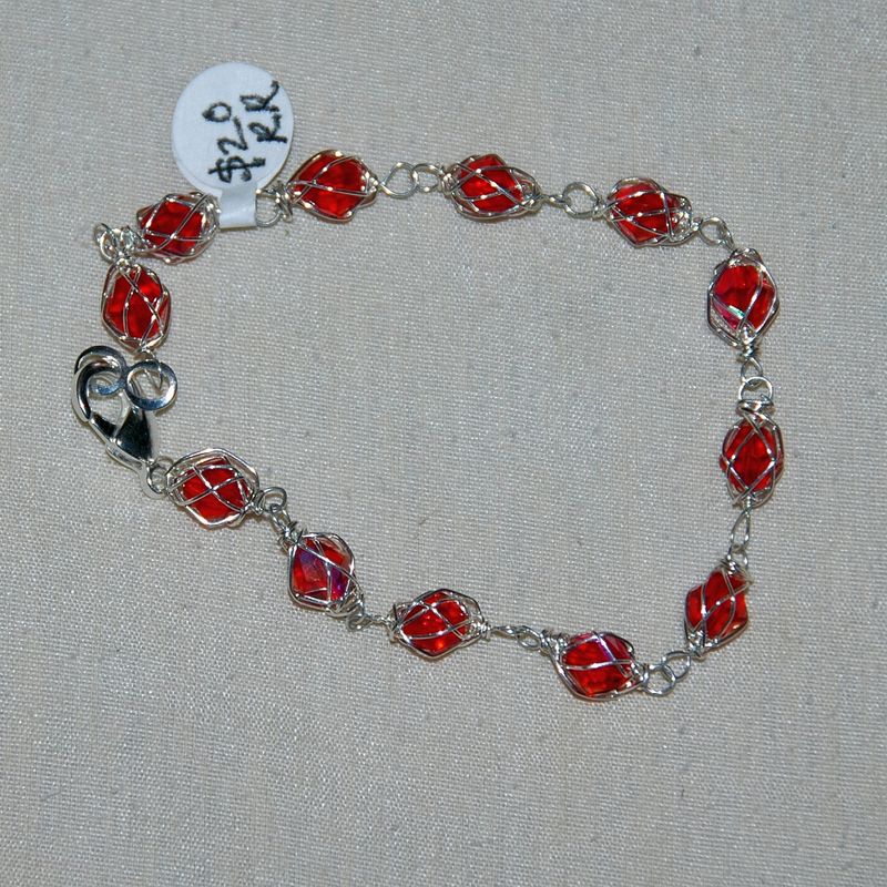red caged crystal bracelet